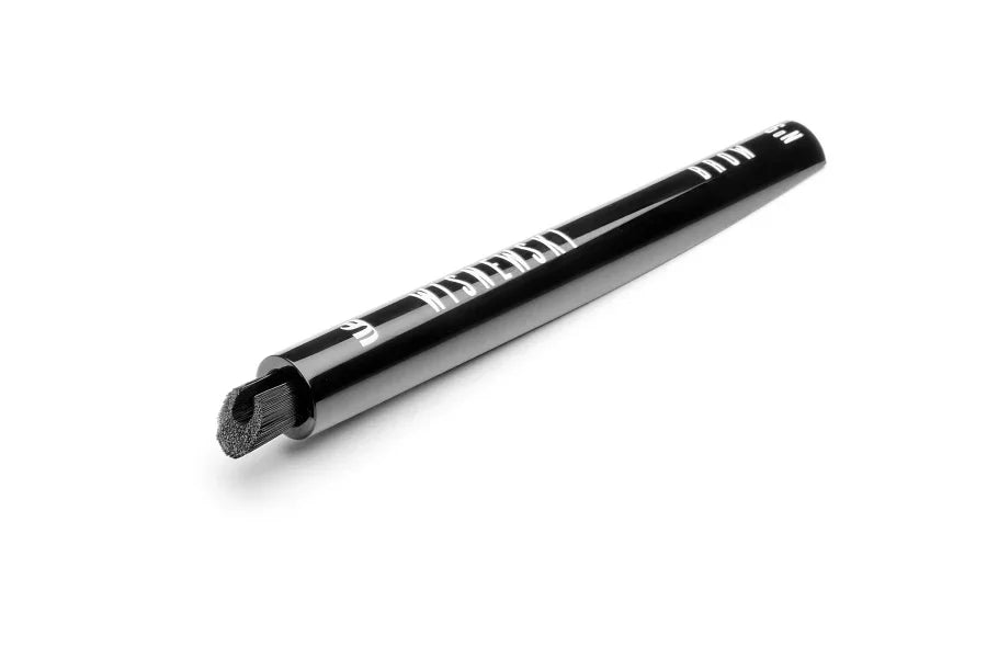 Top view of black Wisnewski #9 Eyebrow Dry Brush Brush. The brush has Wisnewski logo and #9 printed in white. 